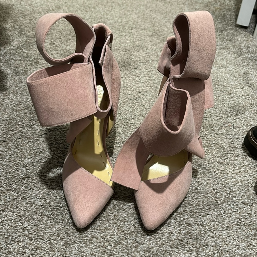 Amina Abdul Jillil pink pumps